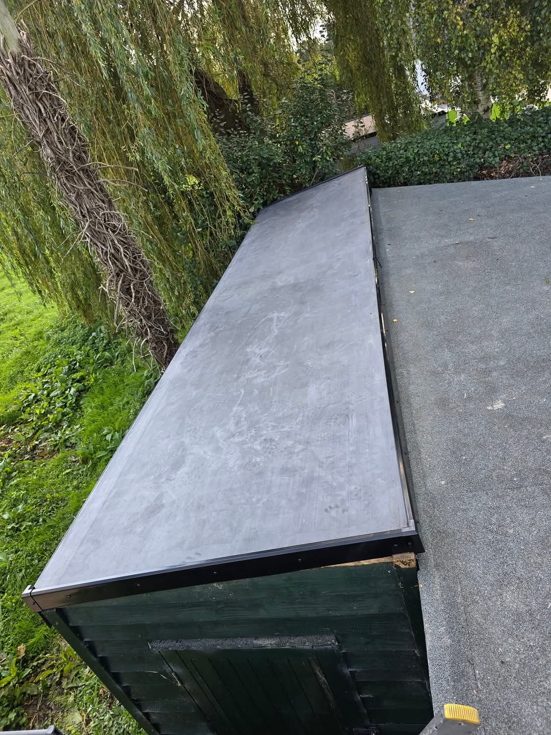 EPDM Layup — Single-piece EPDM rubber membrane bonded.