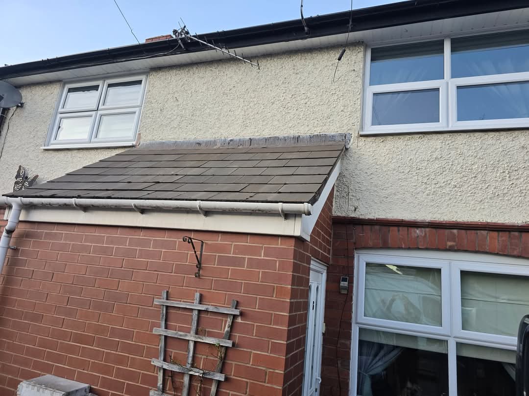 After — Cement-fibre slate, blended in.
